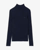 Ribbed merino wool turtleneck sweater