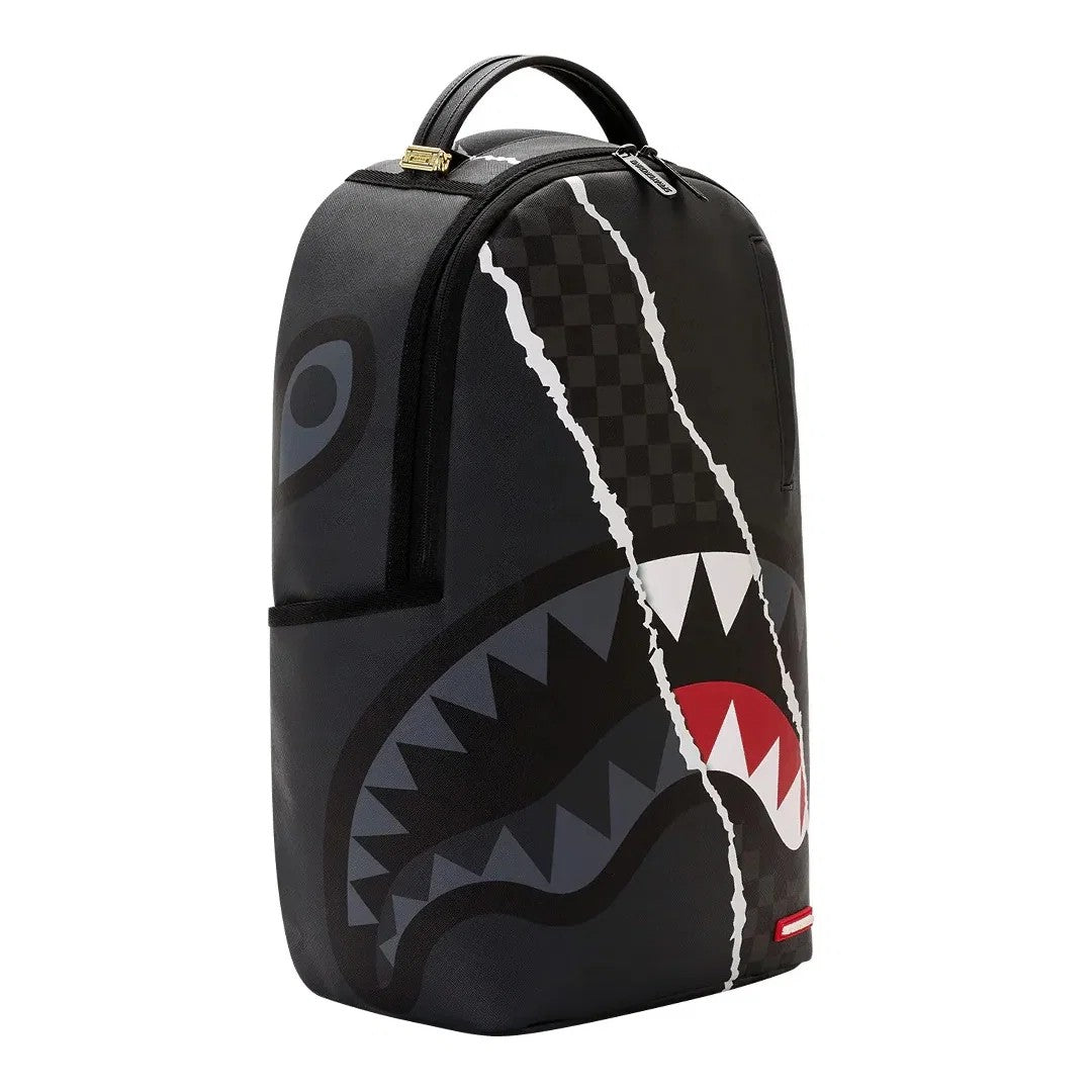 Center rip revealing gray backpack 910B8502 NSZ SPRAYGROUND 