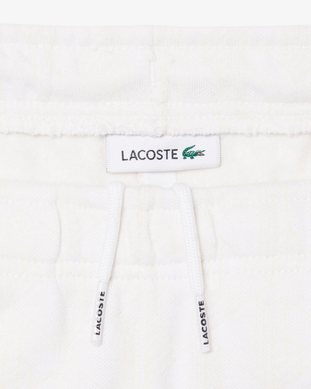 Pantaloni della tuta con monogramma 947110 W8L LACOSTE 