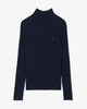 Ribbed merino wool turtleneck sweater