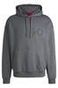Felpa con cappuccio oversize in terry di cotone con logo tono su tono