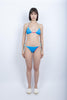 Bikini Saki Nari a triangolo con fianchi regolabili e piping bilberry