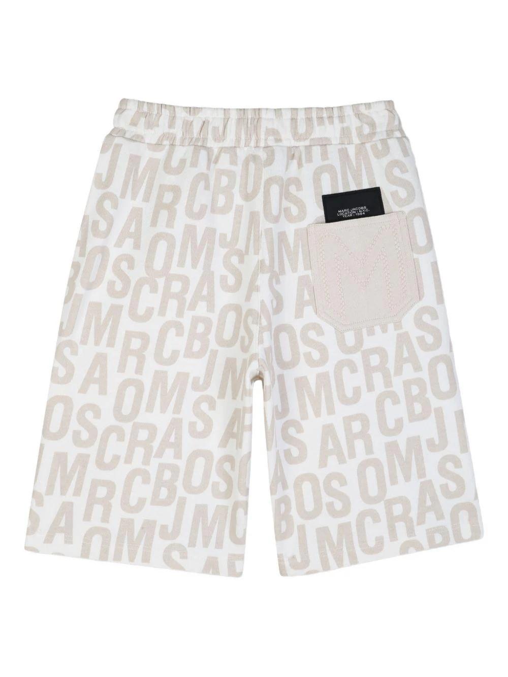 Shorts con logo all-over W60783 126A MARC JACOBS 