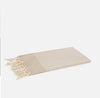 Telo mare Foutas a righe piccole beige e bianche