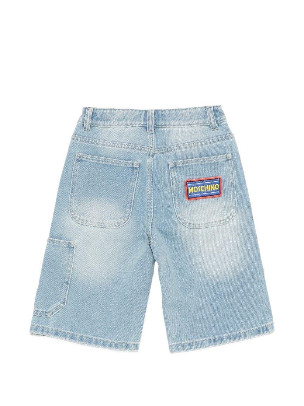 Shorts denim con dettagli ricamati HUQ02KL0E37 41100 MOSCHINO KID 