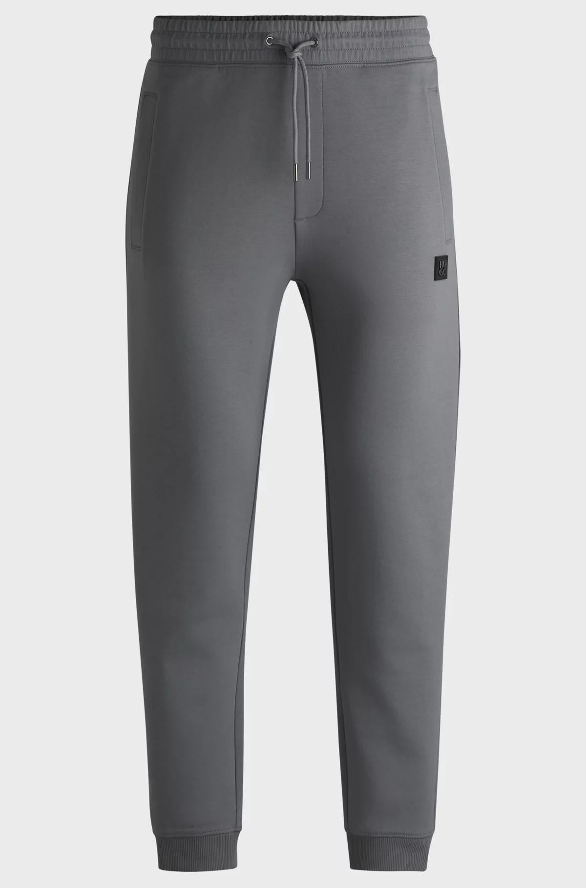 Pantaloni della tuta in misto cotone con logo scomposto 50533695 086 HUGO 