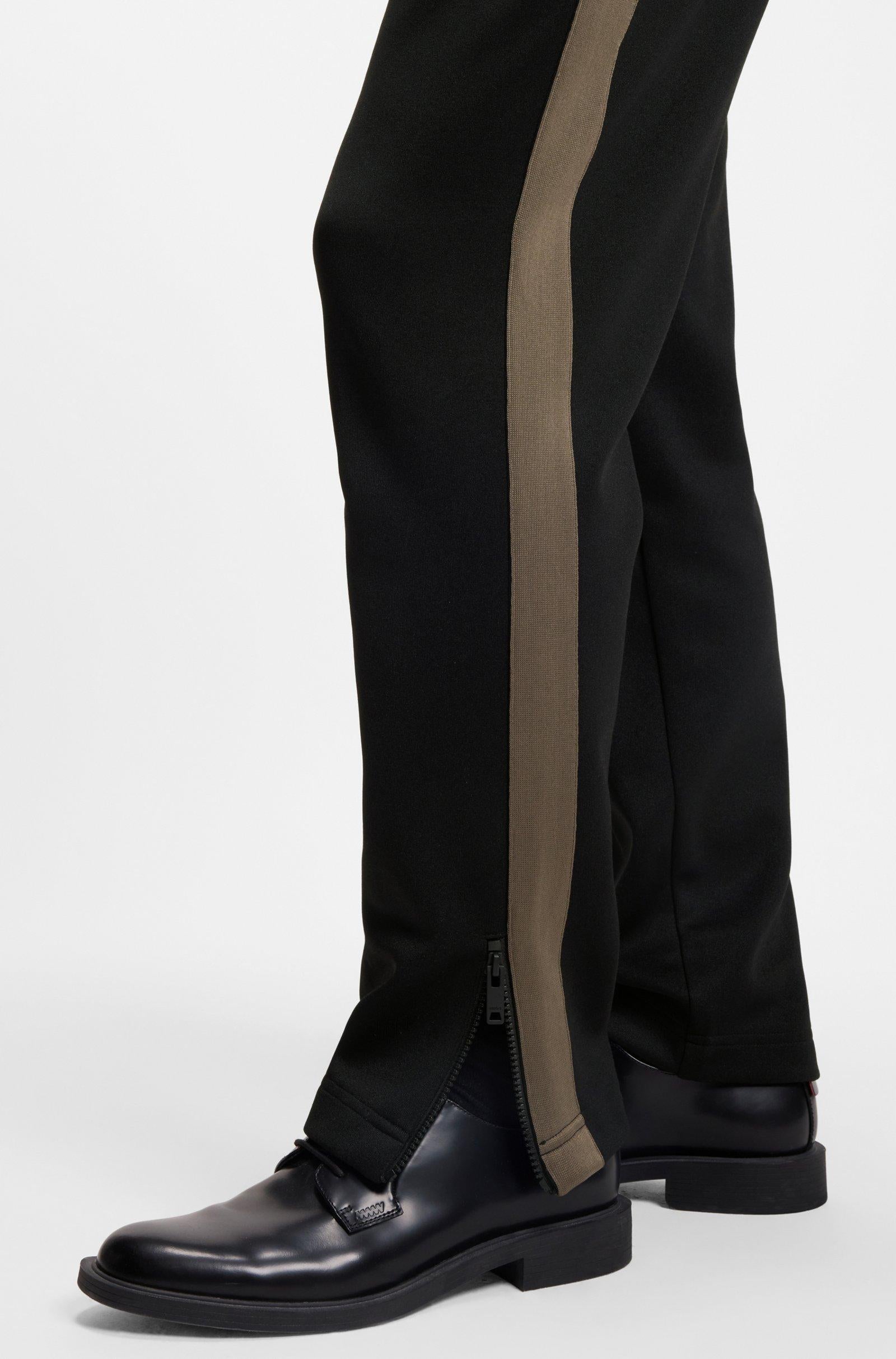 Pantaloni della tuta relaxed fit con banda con logo 50551351 001 HUGO 