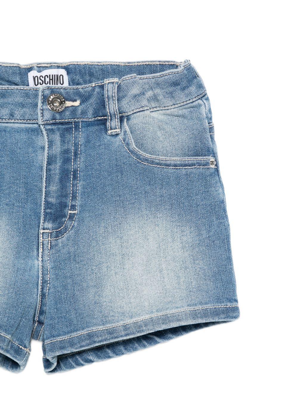 Shorts in denim con stampa grafica sul retro HDQ01XLXE62 40386 MOSCHINO KID 