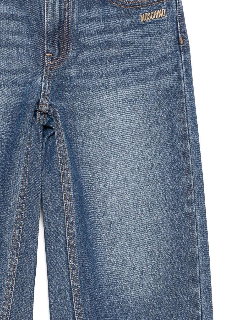 Jeans denim con logo ricamato sul davanti HDP06ML0E29 40244A MOSCHINO KID 