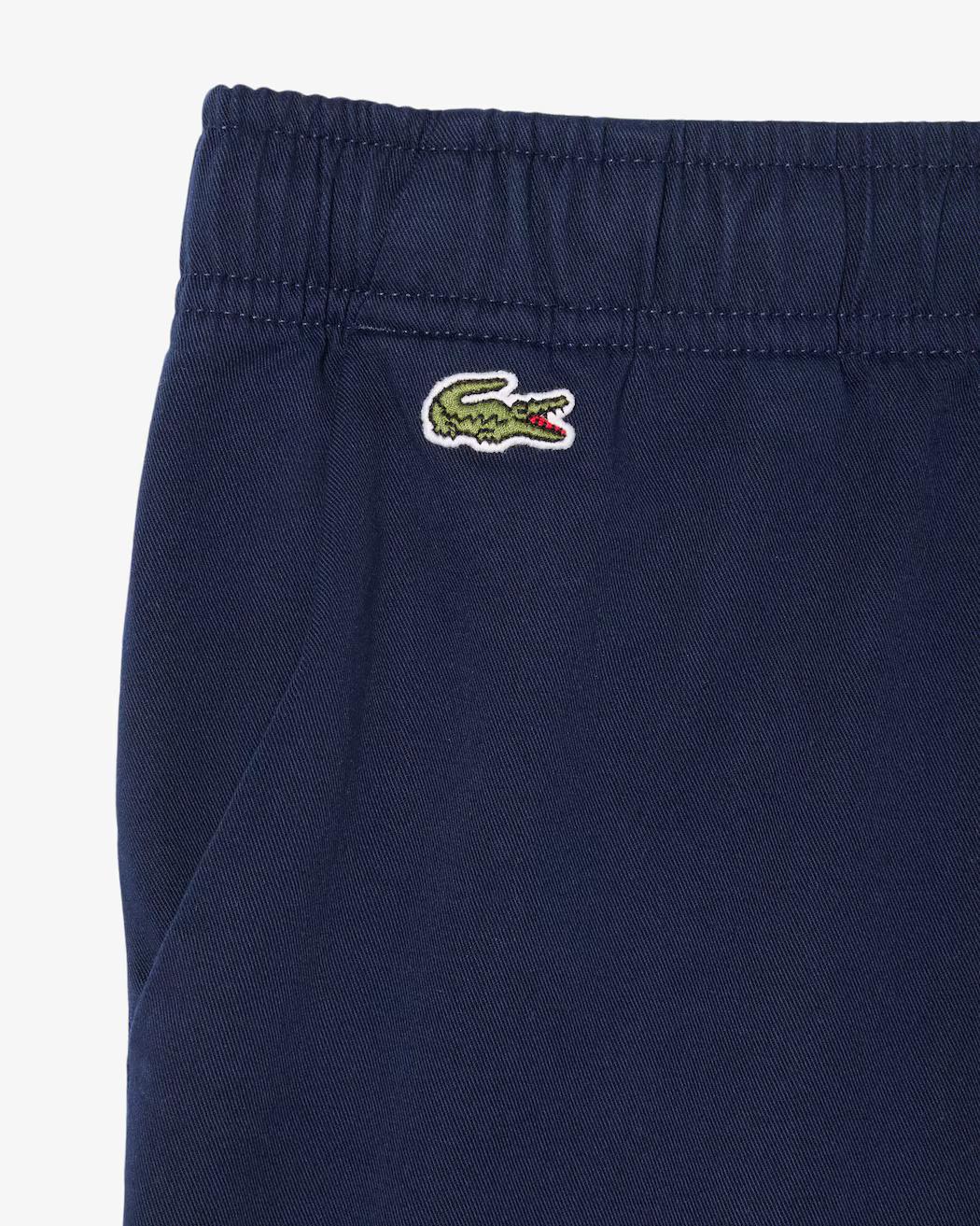 Shorts sportivi in taffetà a rombi 847155 UGW LACOSTE 