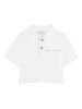 Polo con applicazioni floreali