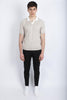 Polo skipper in maglia raglan cotone organico beige bianco