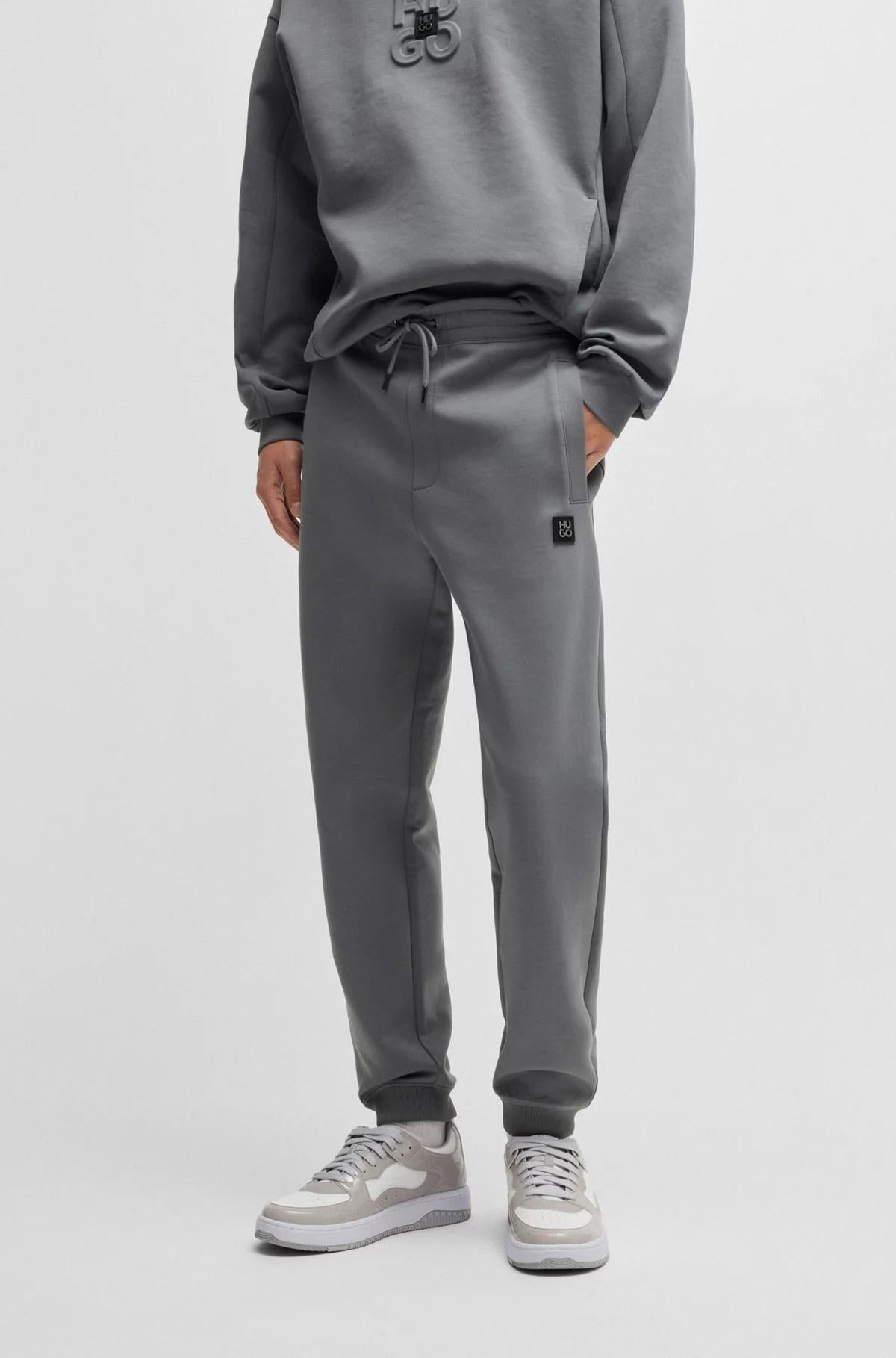 Pantaloni della tuta in misto cotone con logo scomposto 50533695 086 HUGO 