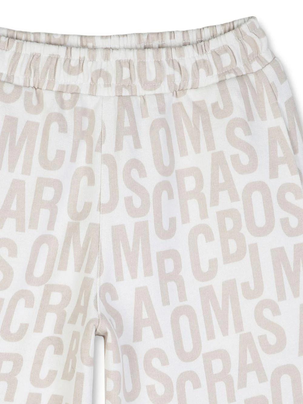 Shorts con logo all-over W60783 126A MARC JACOBS 