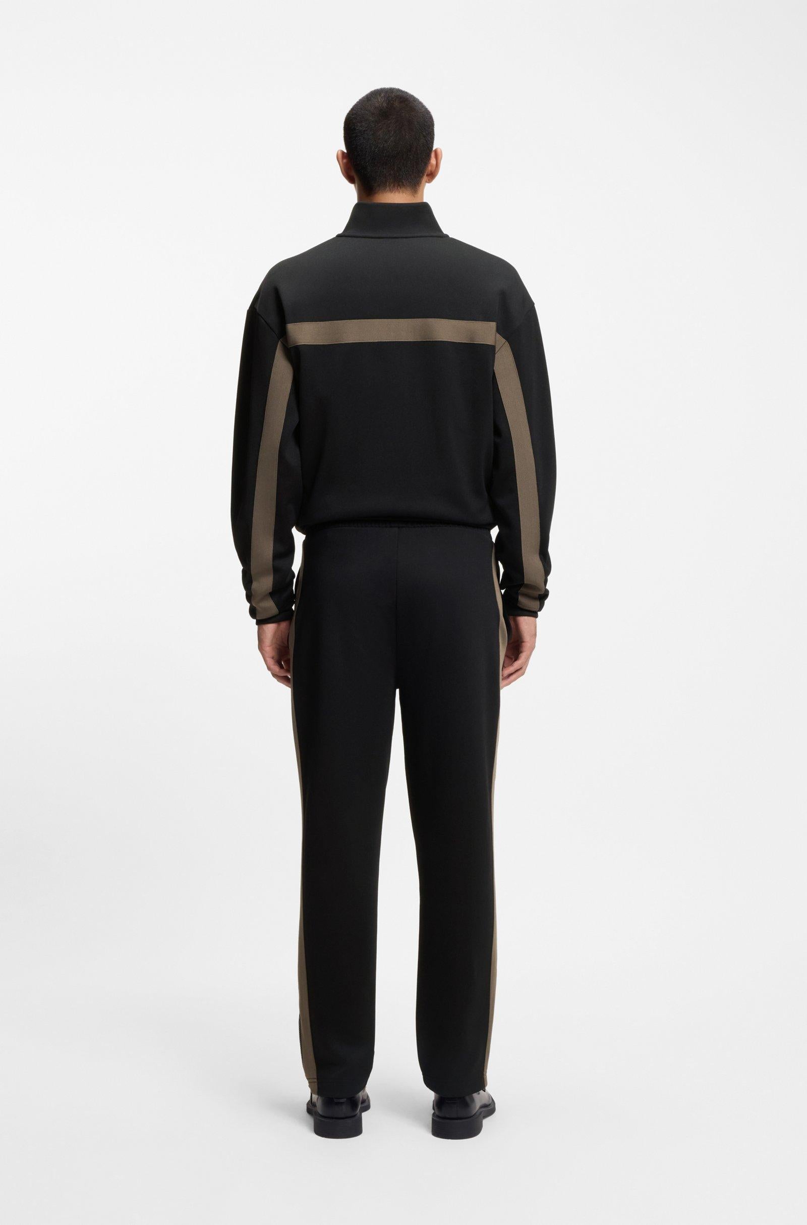 Pantaloni della tuta relaxed fit con banda con logo 50551351 001 HUGO 