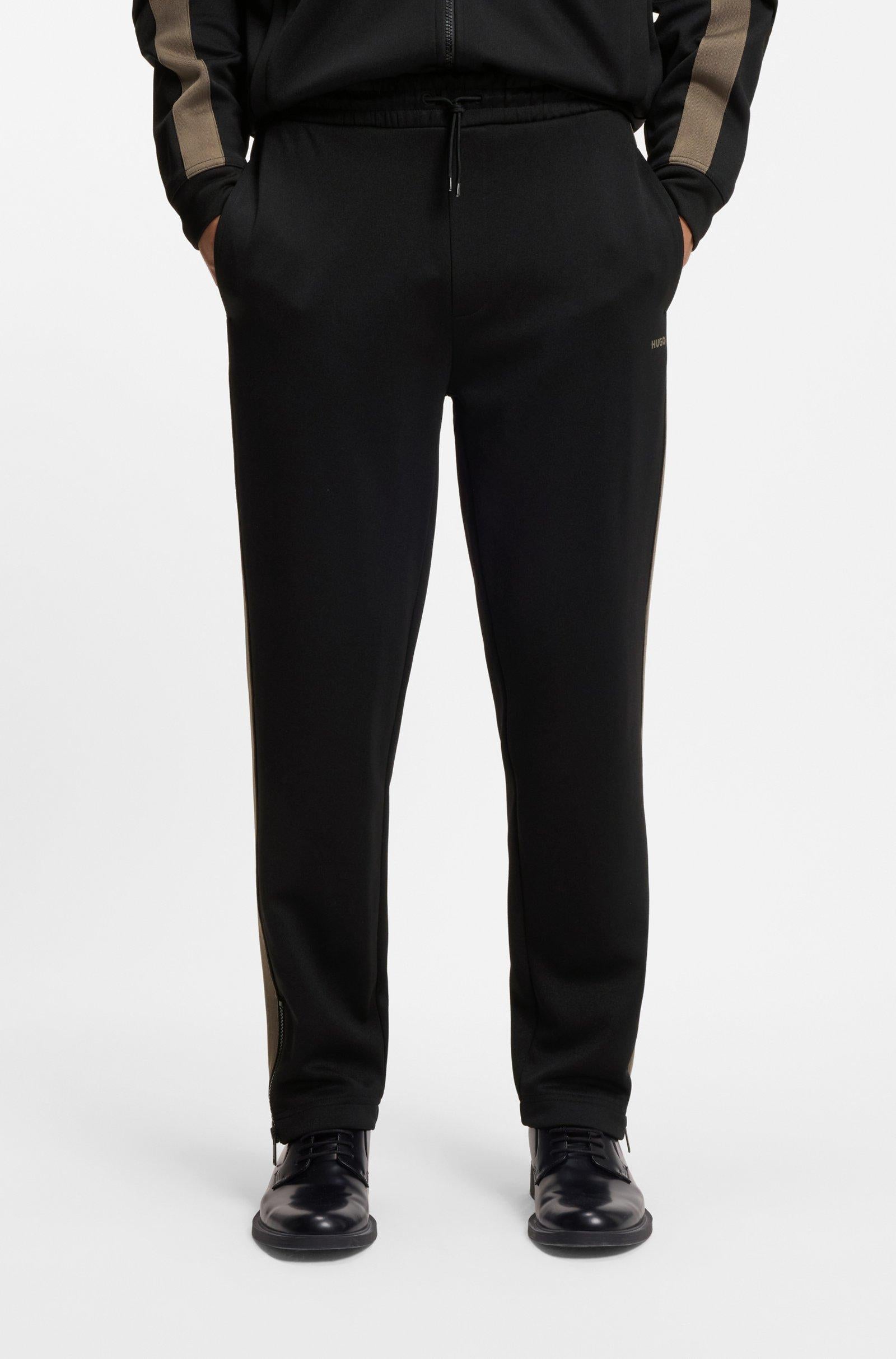 Pantaloni della tuta relaxed fit con banda con logo 50551351 001 HUGO 