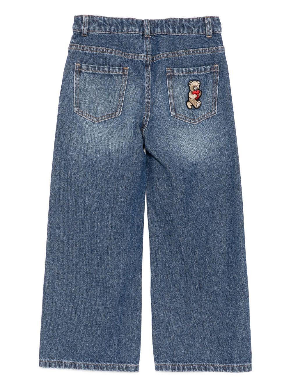 Jeans denim con logo ricamato sul davanti HDP06ML0E29 40244A MOSCHINO KID 