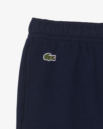 Pantaloni della tuta felpati 847032 UGW LACOSTE 