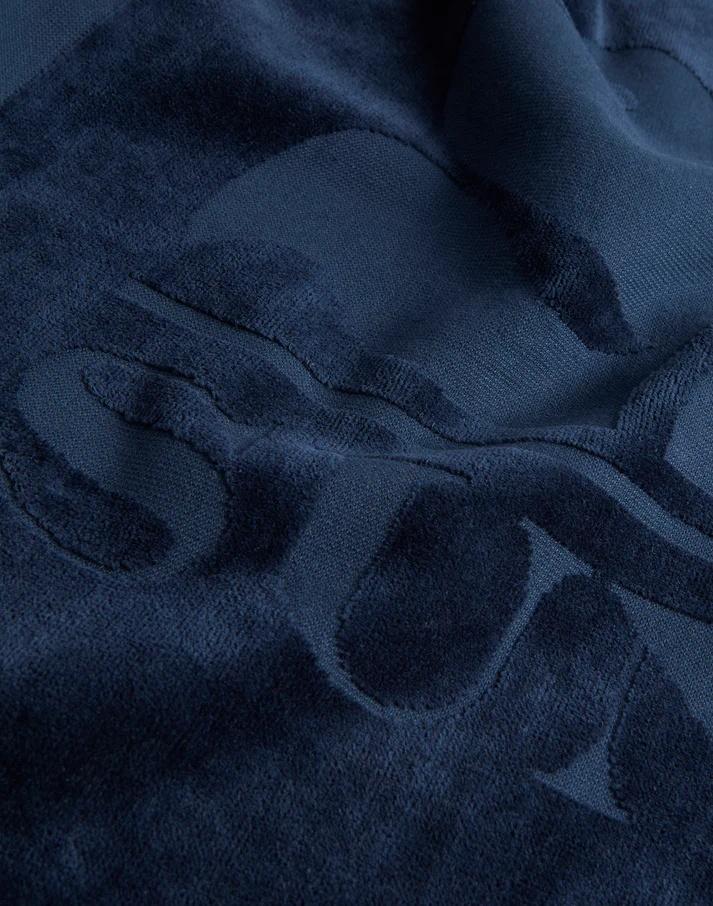 Telo in spugna Jacquard con logo e cornice AM372ATC1000 00700 SUNDEK 