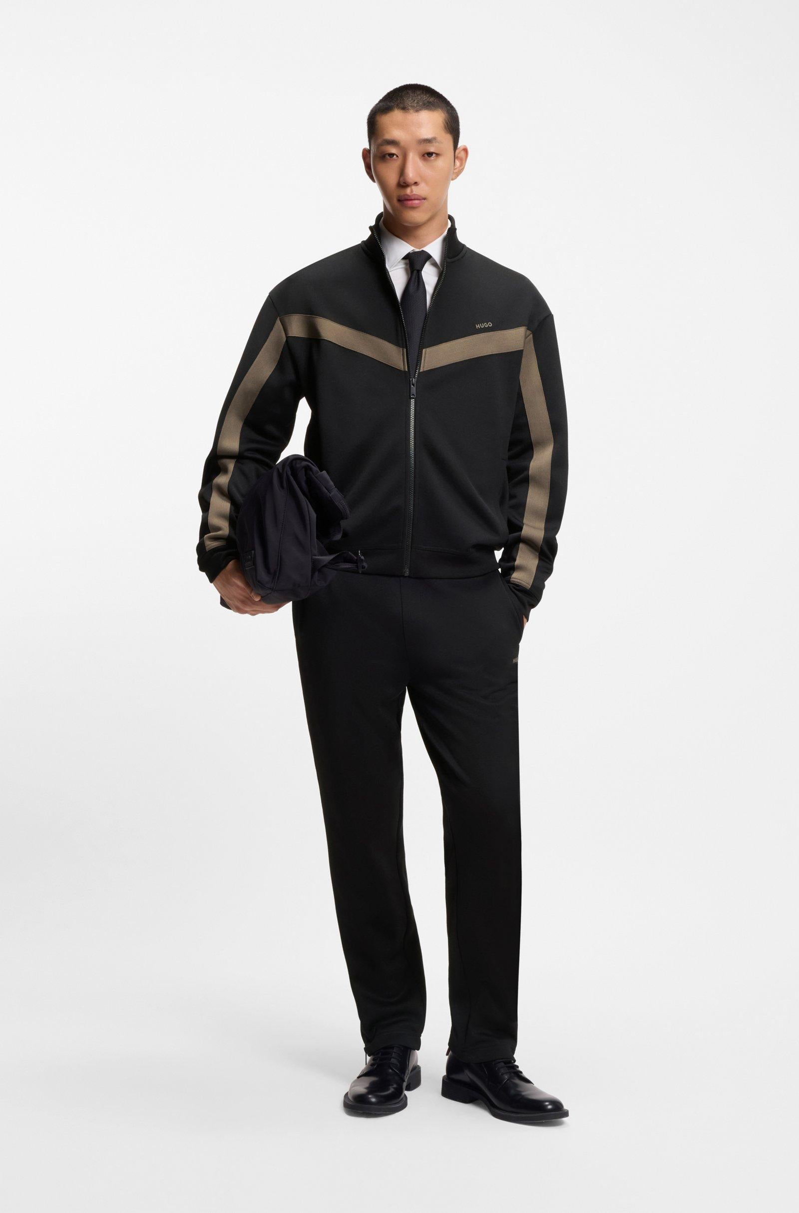 Pantaloni della tuta relaxed fit con banda con logo 50551351 001 HUGO 