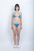 Bikini Saki Nari a triangolo con fianchi regolabili e piping bilberry